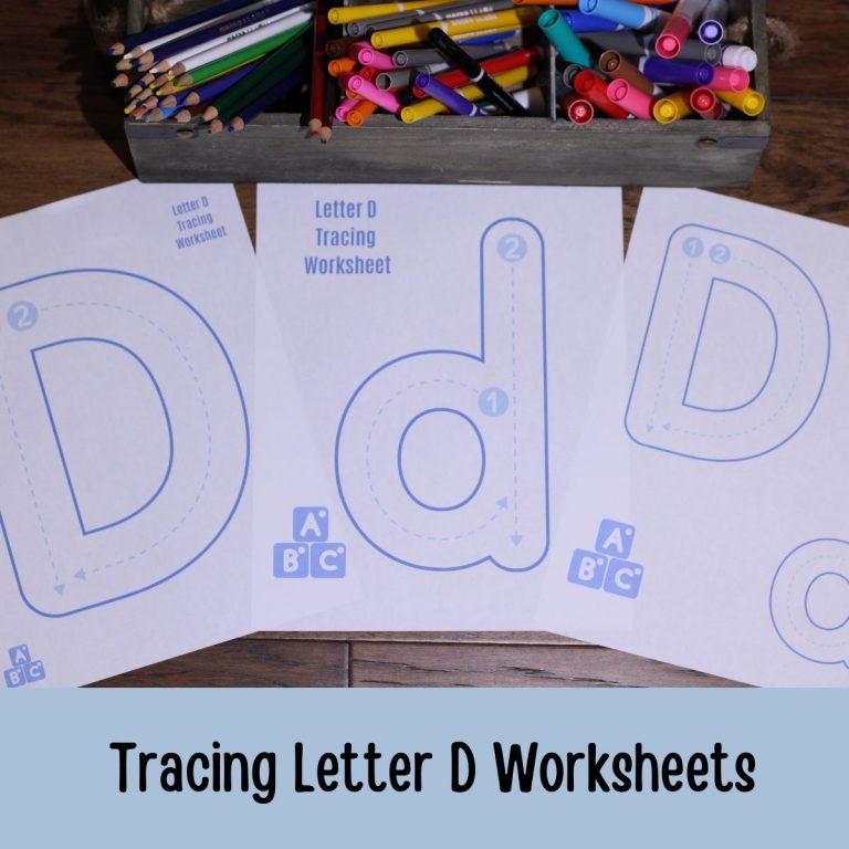 Tracing Letter D Worksheets on a table with writing utensils
