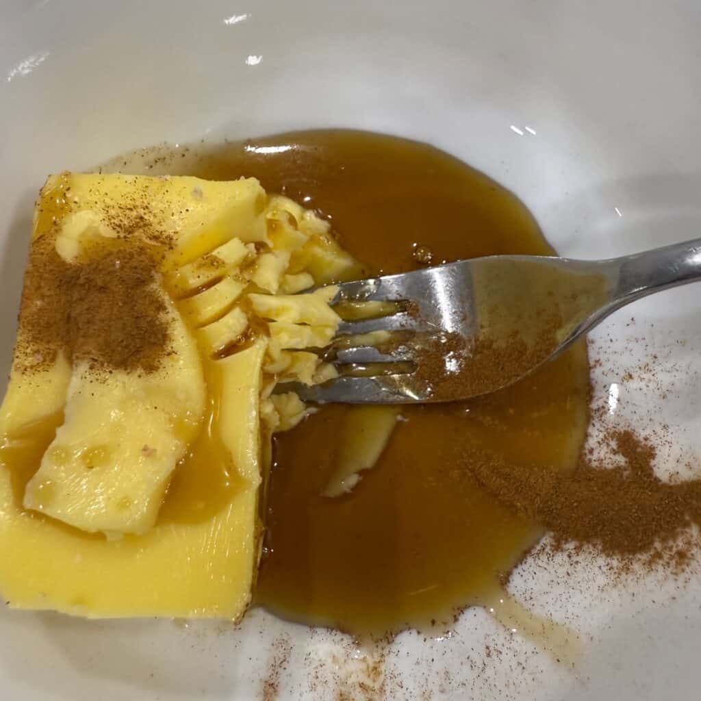 Crush butter with fork to combine