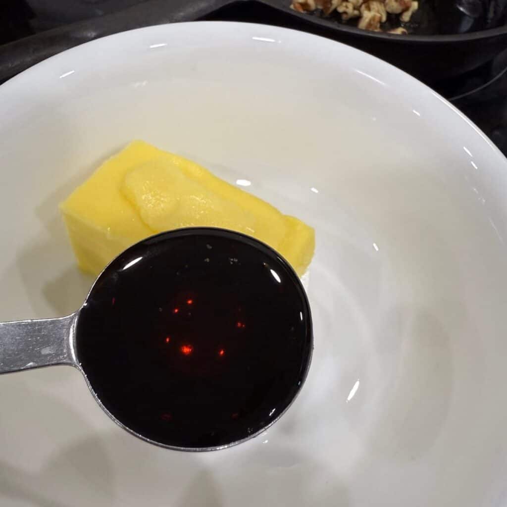 Start to combine ingredients Butter and maple syrup